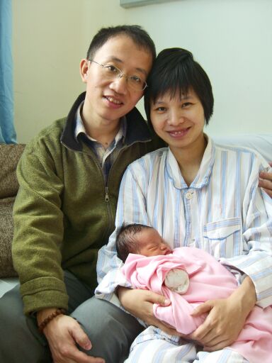 Hu Jia and Zeng Jinyan with their baby